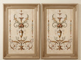 Pair of hand-carved gilded Fontainebleau art frames with floral urn panels.