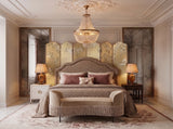 Hand-painted 23-karat gold leaf wallcovering panel featuring the Gilt Bloom Bedroom Frieze motif, installed in a bedroom setting.