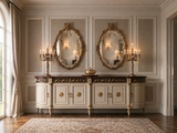 Hand-carved gilded Venetian mirror with oval Venetian frame, styled in a salon setting.