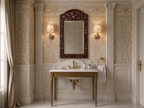 Hand-carved gilded Venetian mirror with arched scrolled frame, styled in a dining room setting.