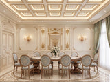 Hand-carved gilded Venetian mirror with oval Venetian frame, styled in a dining room setting.