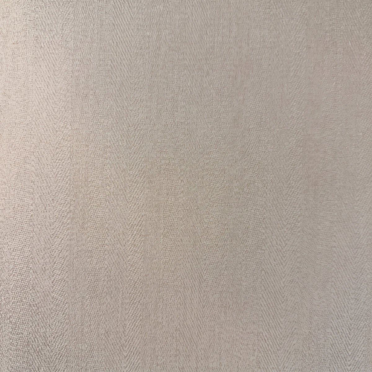 Vinyl-print wallcovering in a tonal grey herringbone-chevron motif, shown as a product swatch.