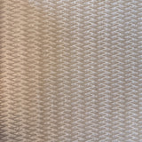 Vinyl-print wallcovering in a warm taupe herringbone-chevron weave motif, shown applied to a wall panel.