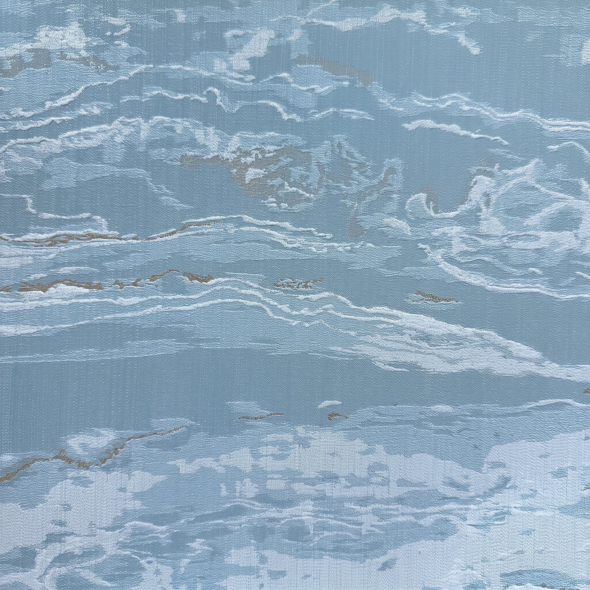 Vinyl-print wallcovering in a powder-blue abstract marbled wave motif, shown applied to a bedroom feature wall.