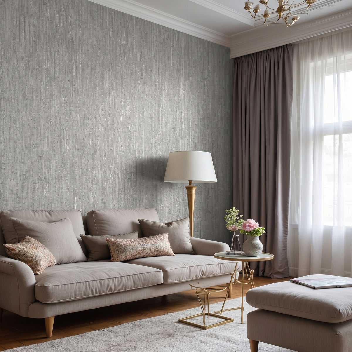 Plain tonal textured vinyl-backed wallcovering in fine seamless-grain finish, sandy-beige ground, shown applied to a wall.