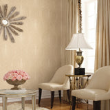 Vinyl-print wallcovering in a bronze pinecone-and-frond motif on woven taupe ground, shown as a product swatch.