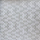 Vinyl-print wallcovering in a silver-grey interlocking geometric motif on taupe ground, shown as a product swatch.